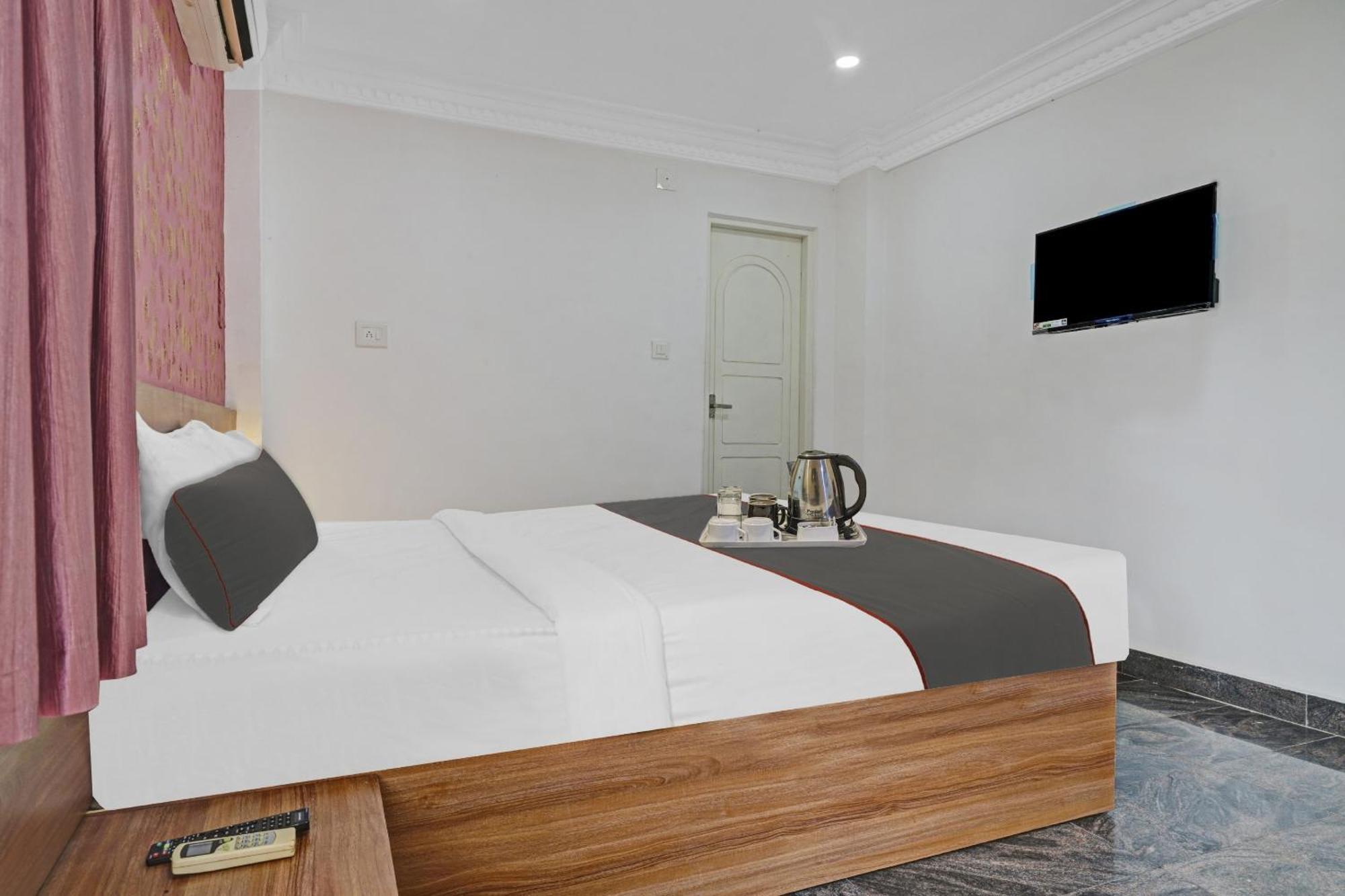 Hotel Capital O Rayan Plaza à Kochi Extérieur photo
